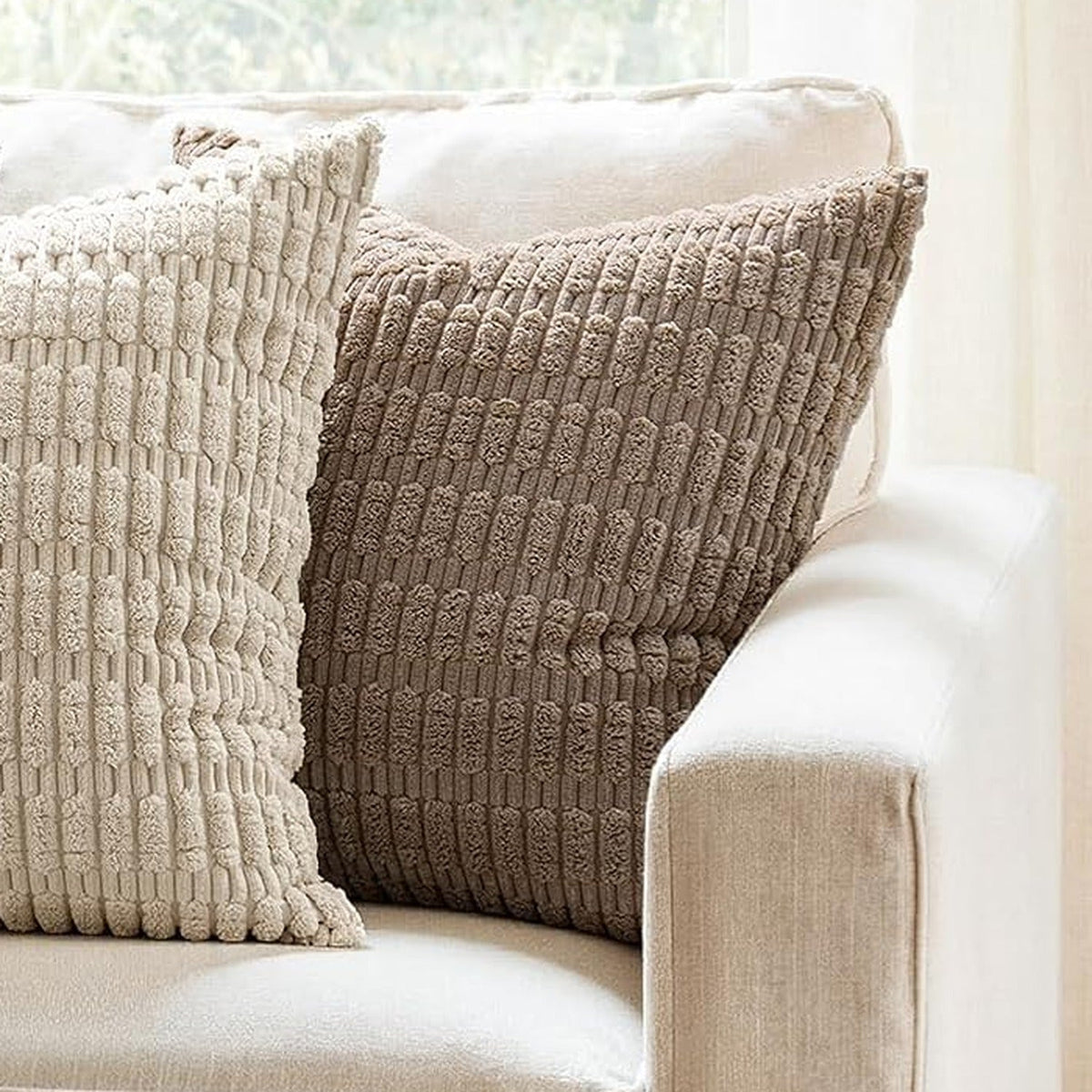 Taupe chunky corduroy pillow cover 18x18 in on a beige couch