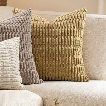 Mustard chunky corduroy pillow cover 18x18 in on a cream sofa